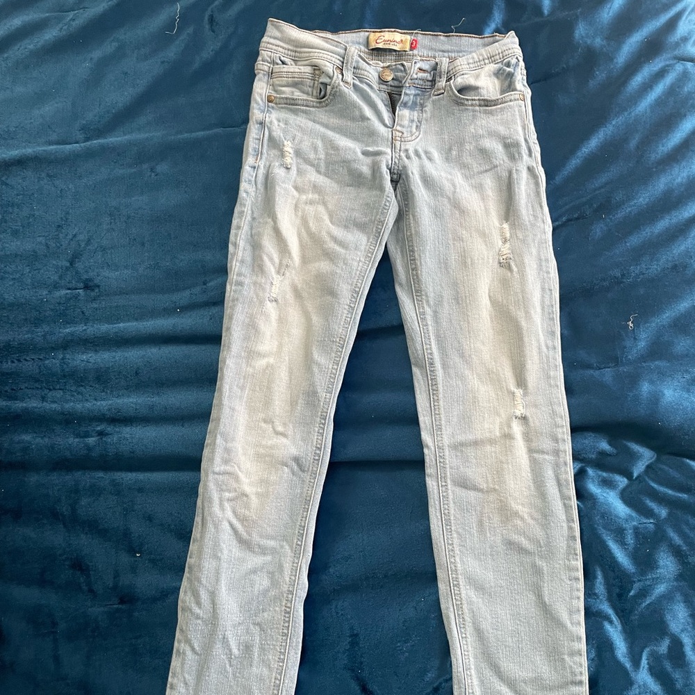 rustic light blue jeans